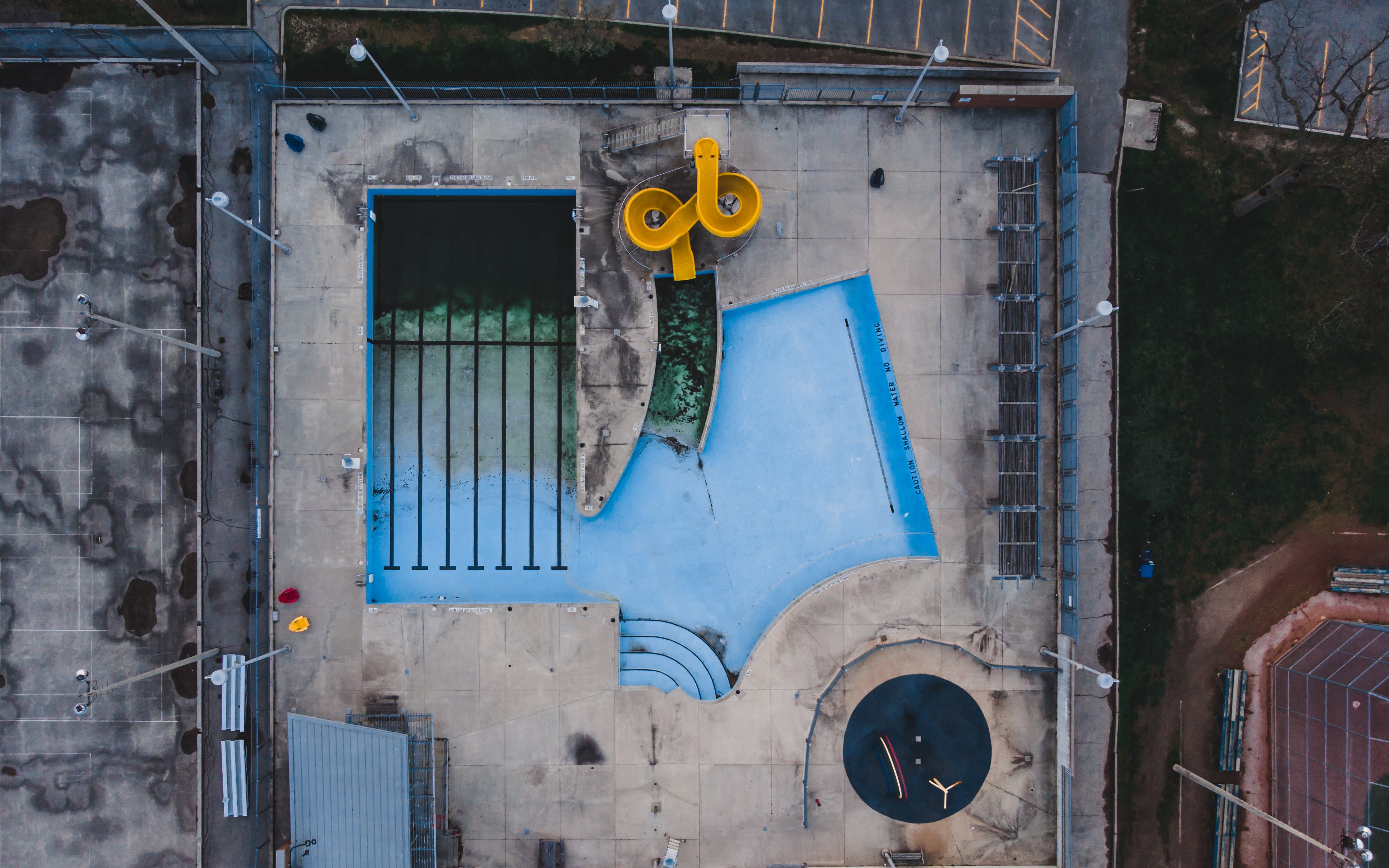 Bird's eye view of pool with no rubber surfacing